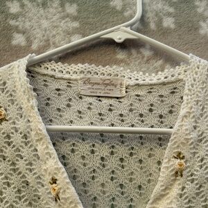 Beige Lace-Pattern V-Neck Sweater with Floral Accent